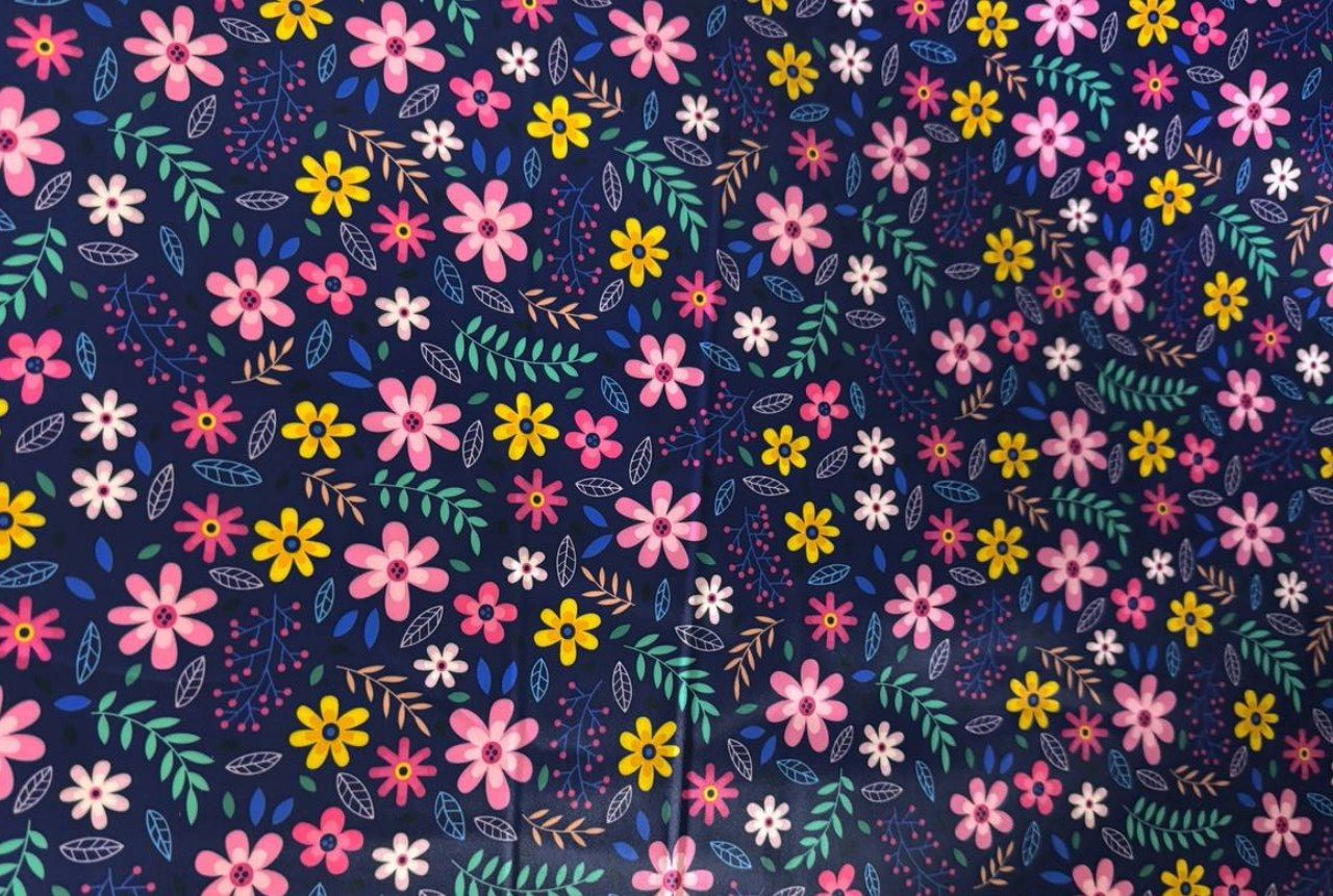 پارچه دیبا پشت ساتن طرح گلدار سرمه ای